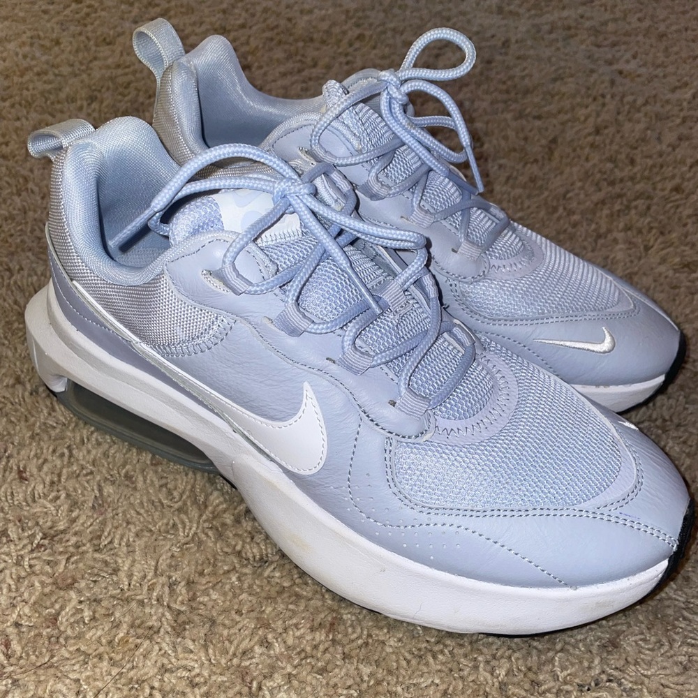 Never worn Nike shoes. Purchases wrong size and couldn't return.